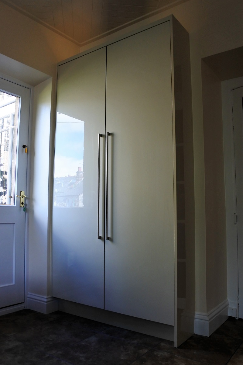 Tall Bespoke Pantry utilising storage